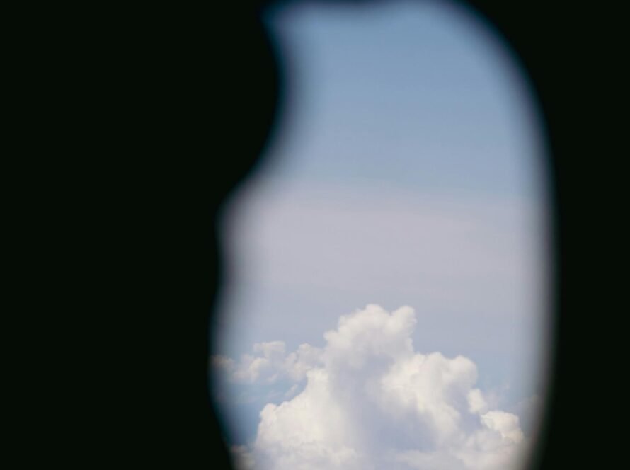 8CLICKS| a view of the sky through a window