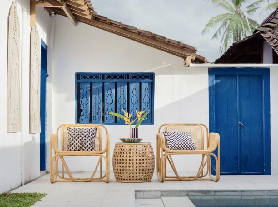 a chair and table by a pool