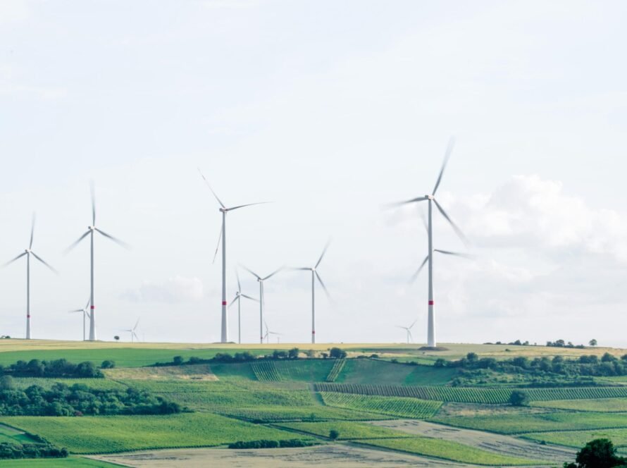 a group of windmills in a field