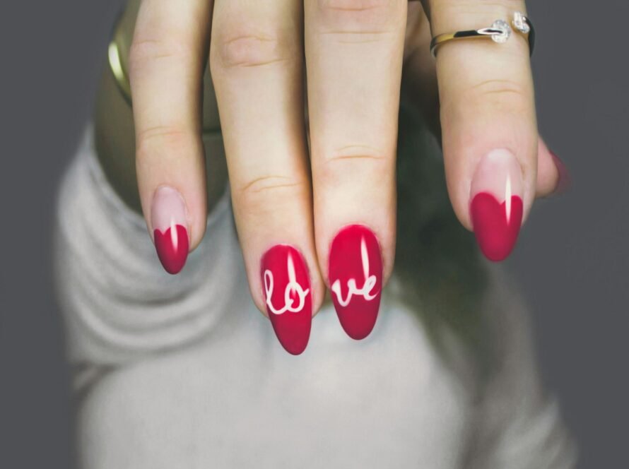 a hand with painted nails