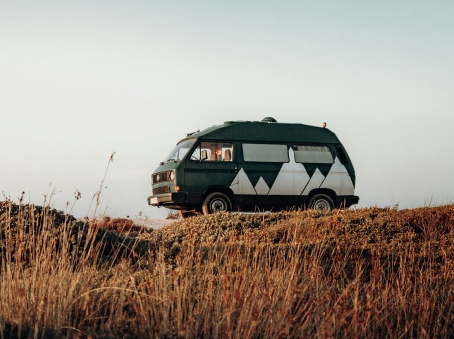 a van driving on a hill