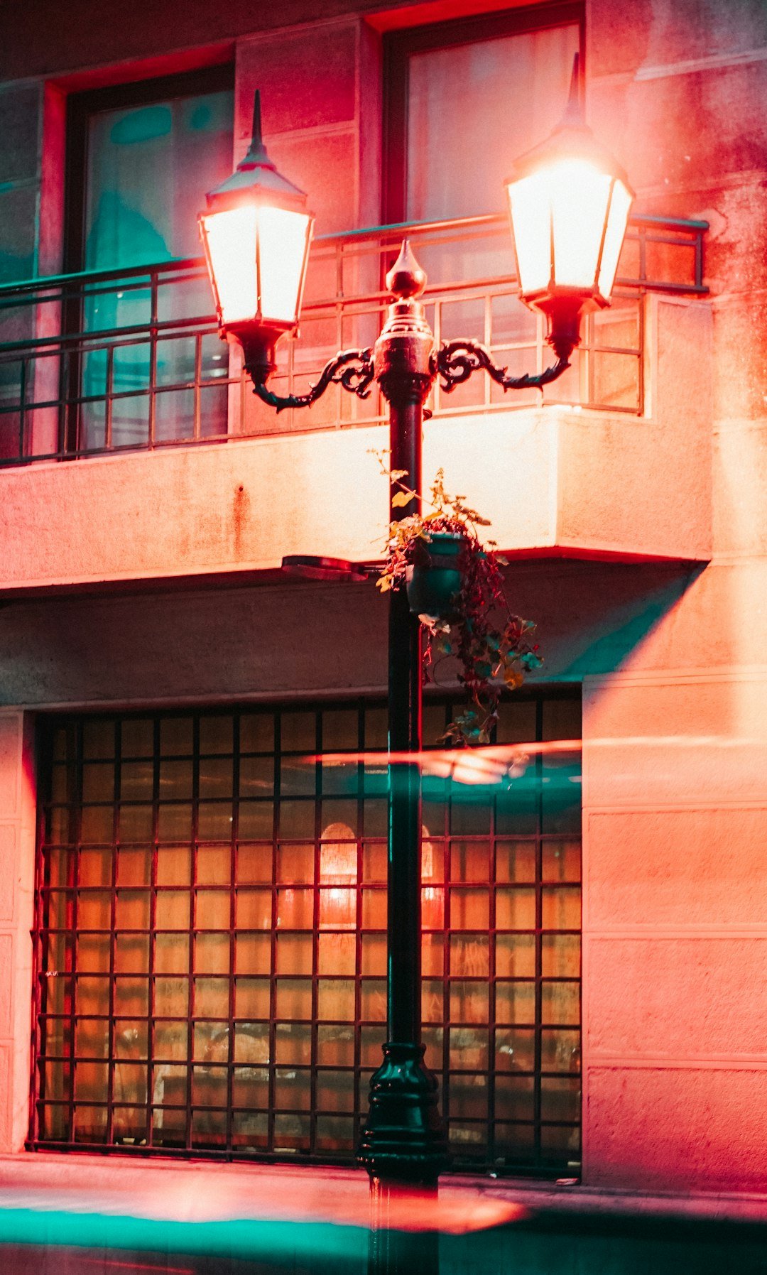 a lamp post with two lights on