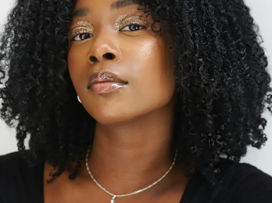 Person with curly black hair.