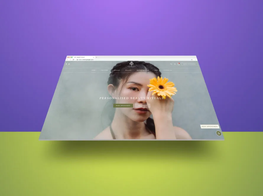 sage and fawn beauty salon homepage with a yellow gerbera daisy portrait on a purple-green gradient