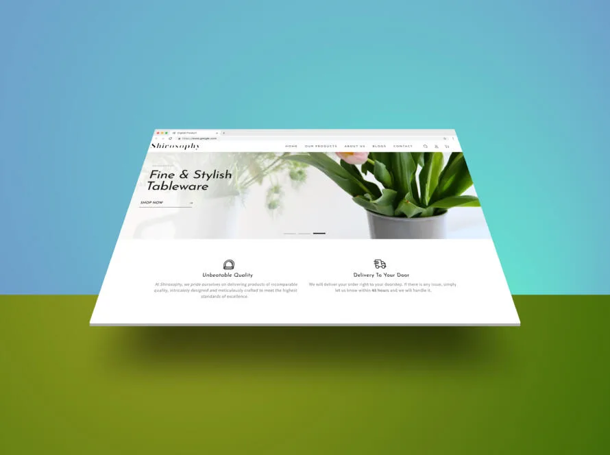 shirosophy ecommerce homepage shown at an angled perspective, with fine tableware and green plants